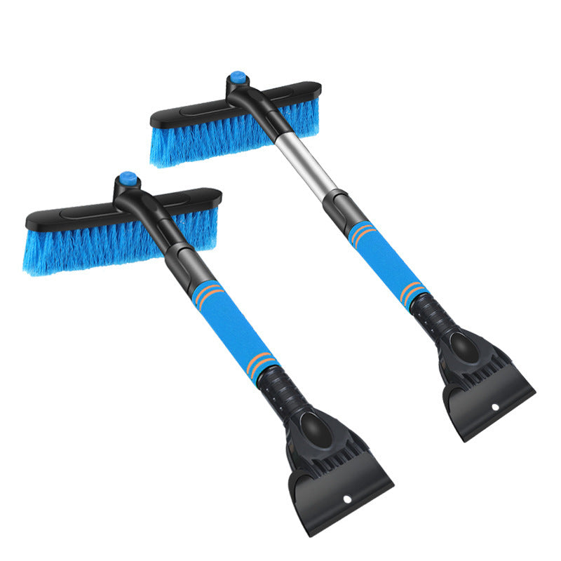 Extendable snow brush clearing a snowy car