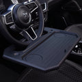 Steering wheel tray used as a laptop desk in a parked car - view 2